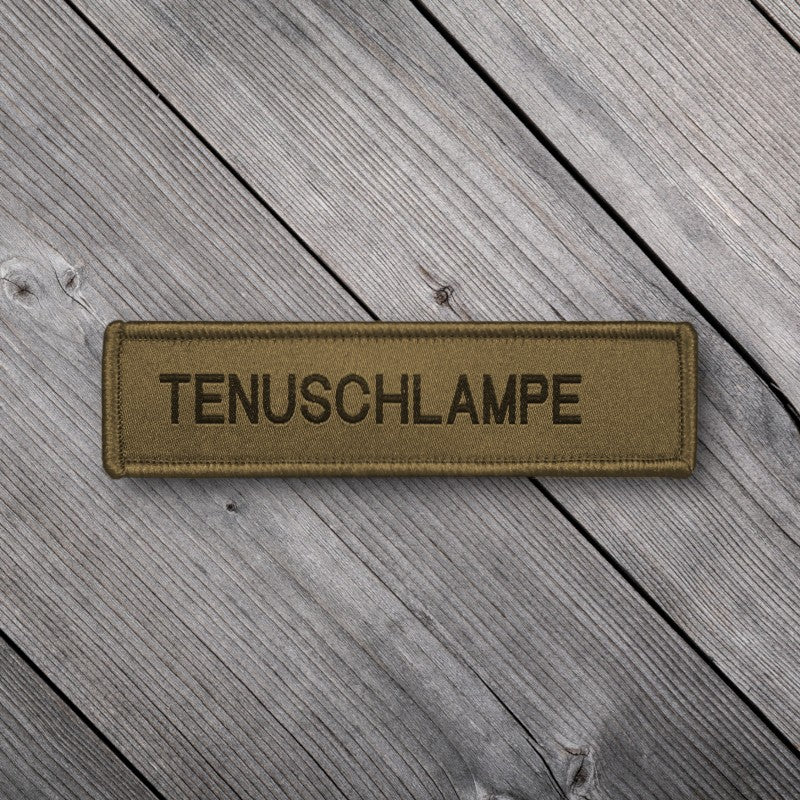 Armée Suisse - Nom TAZ - TENUSCHLAMPE